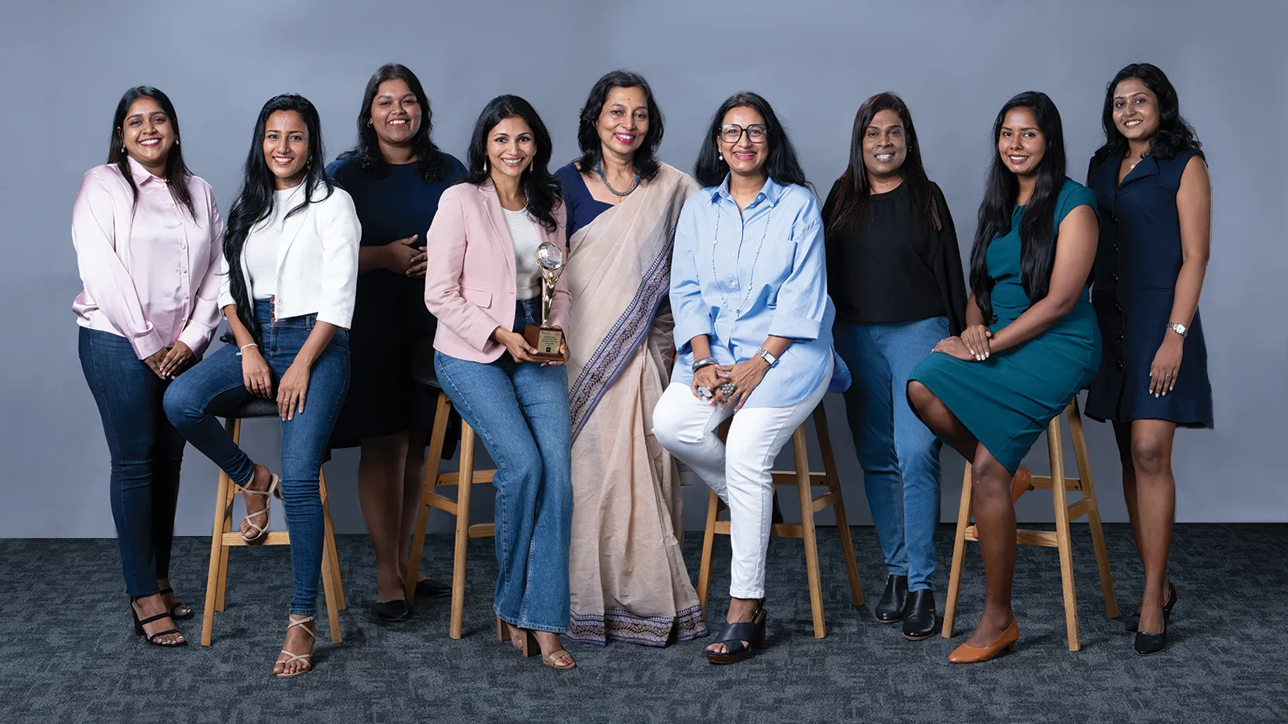 The MAS Holdings team with the gold trophy for DEI Champion of the Year