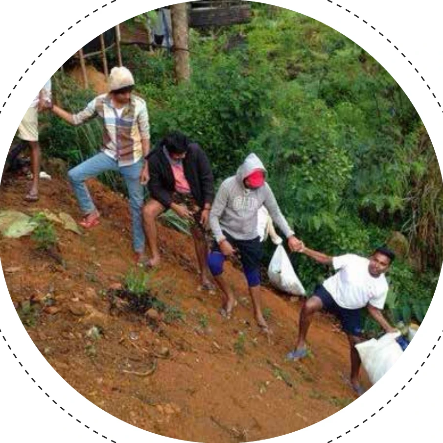 Volunteers carrying waste bags down the Sri Pada (Adam’s Peak) trail during the cleanup