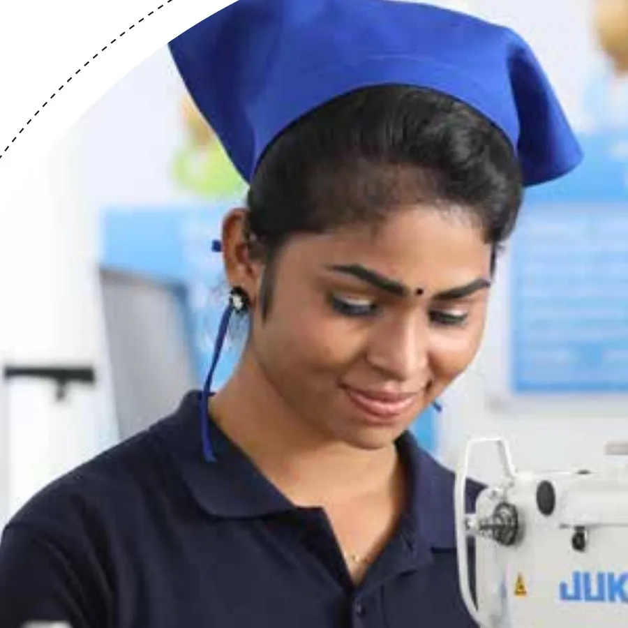MAS team member at a sewing machine